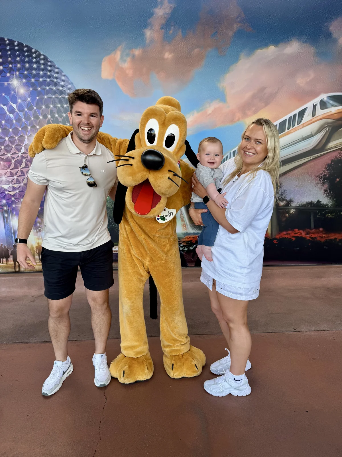 Jodie, Adam and George meeting Pluto at Walt Disney World