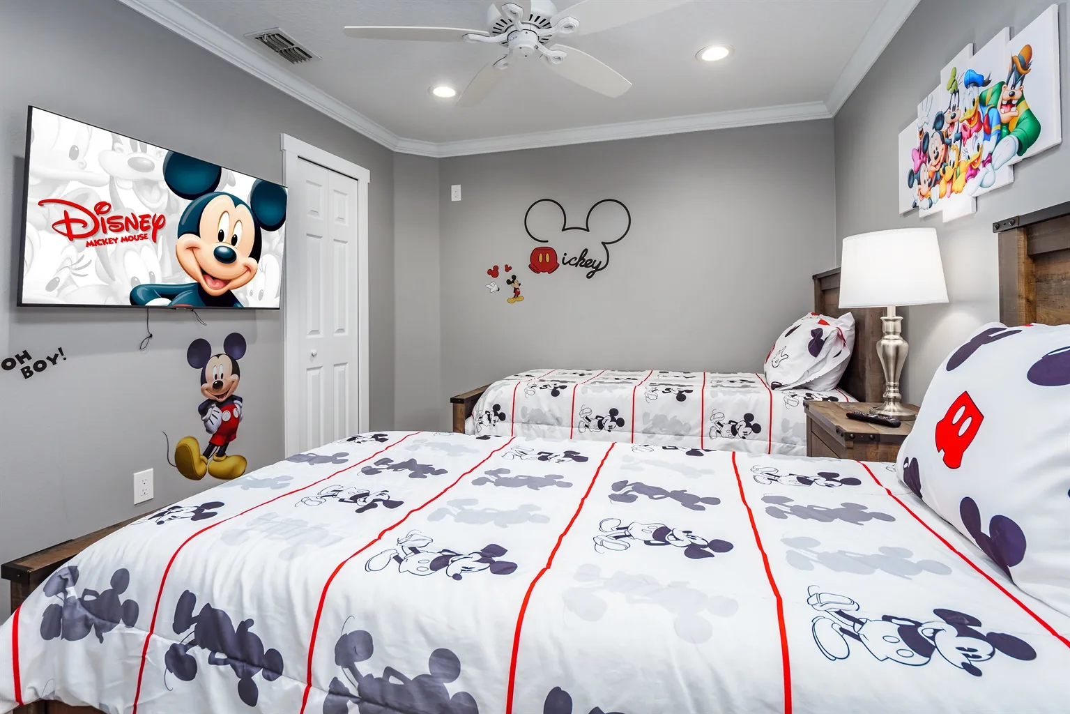 Twin beds with Mickey Mouse bedding and Disney-inspired decor in a Formosa Gardens villa