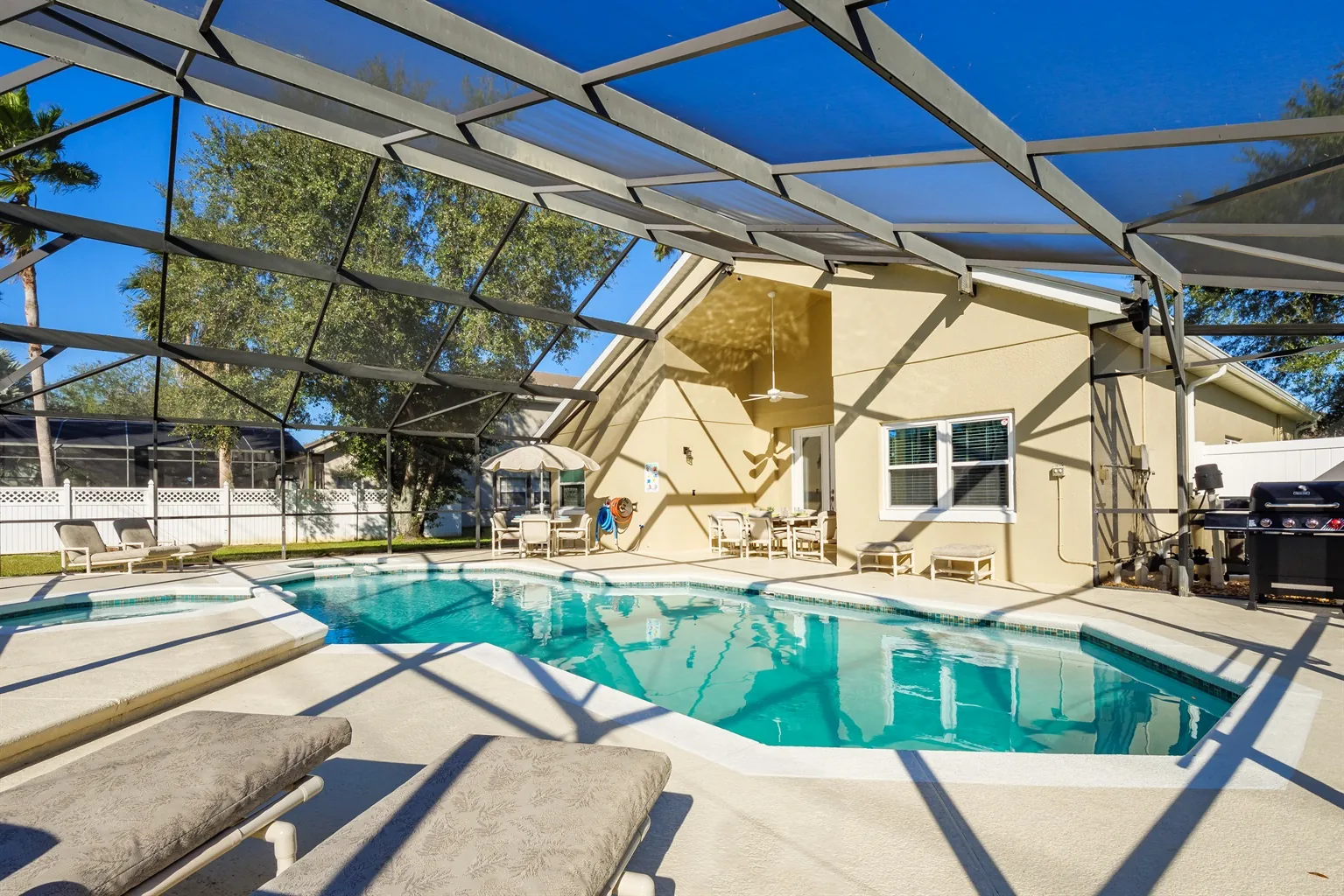 A sunny private pool and screened terrace at a Formosa Gardens villa