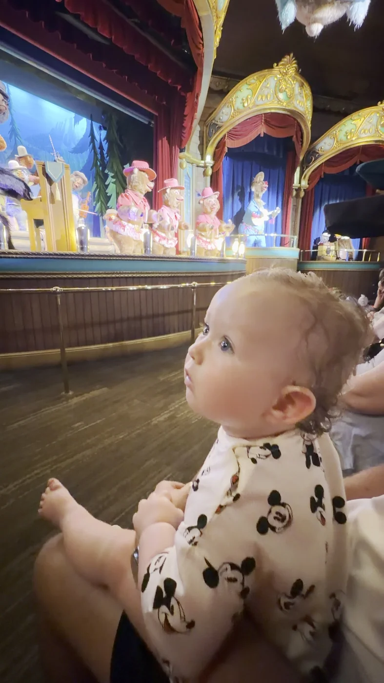 George watching the bear band on stage at Country Bear Musical Jamboree