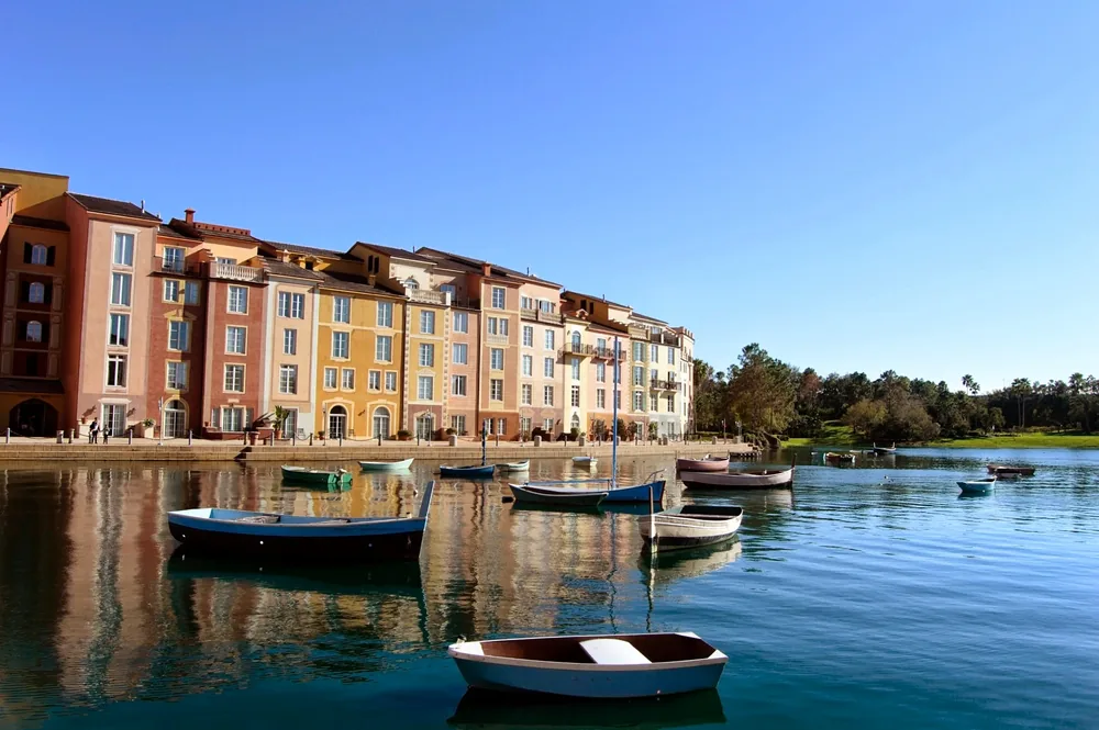 Colourful waterfront buildings and boats at Loews Portofino Bay Hotel.